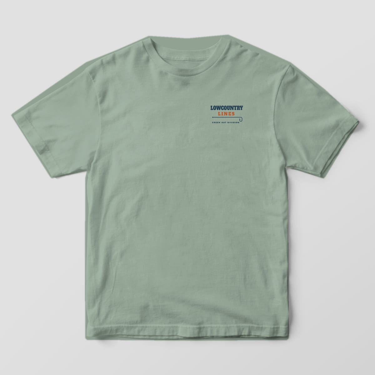 Bay green Comfort Colors tee, front view, with a small Lowcountry Lines wordmark on the left chest