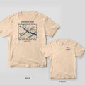 Back and front of an ivory T-shirt: back shows a vintage-style creek chart with an X marking the spot and It's Not On Any Map; front has a small redfish logo