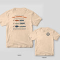 Back and front of an ivory T-shirt: back shows The Inshore Slam scorecard with a redfish, trout and flounder checked off; front has a round LC badge