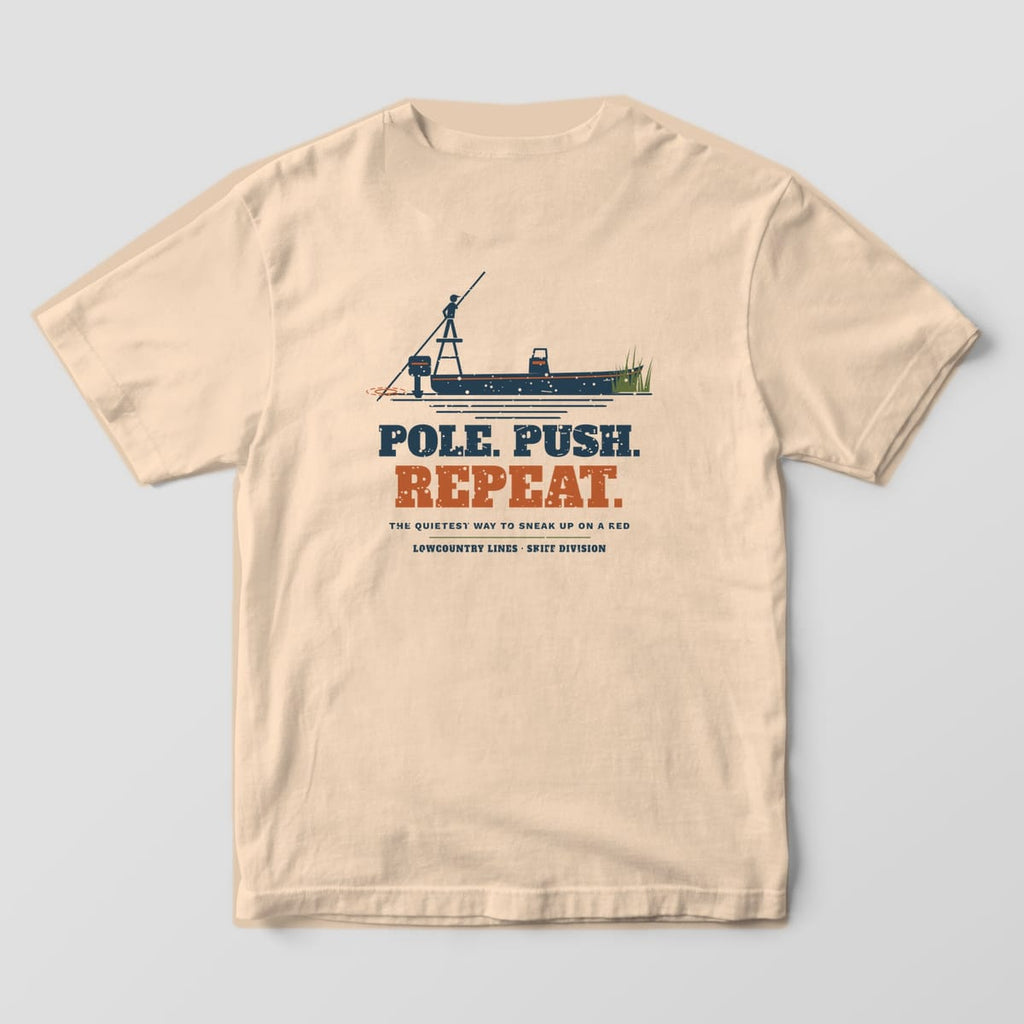 Ivory Comfort Colors tee, back view, with a navy flats skiff and poler above large Pole Push Repeat lettering