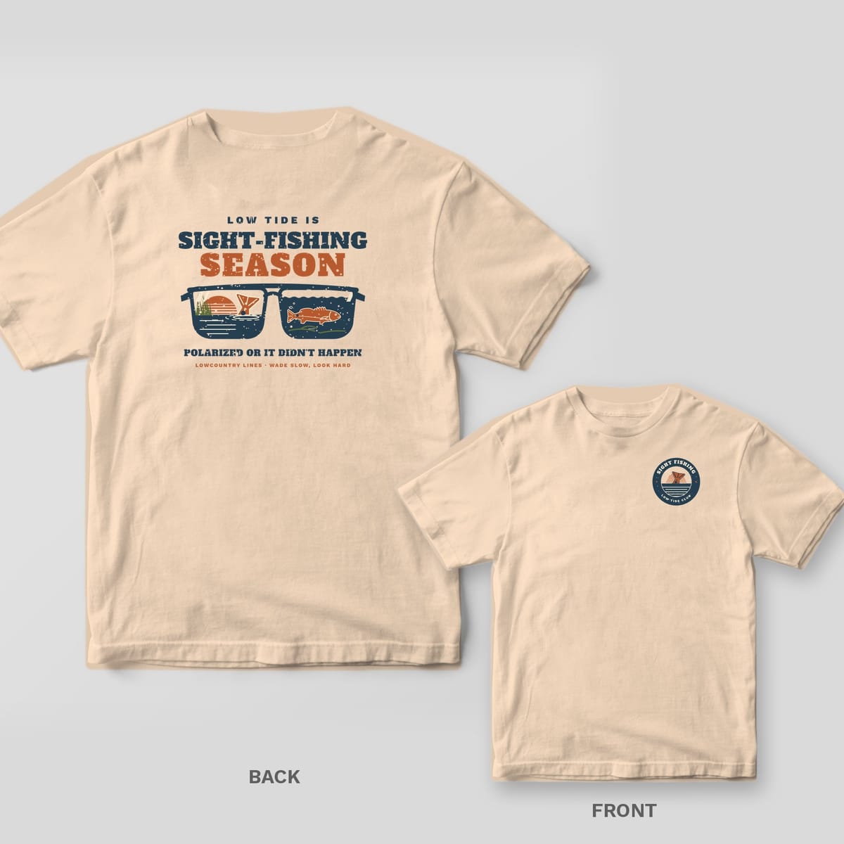 Back and front of an ivory T-shirt: back shows sunglasses with redfish scenes in each lens under Sight-Fishing Season; front has a round badge