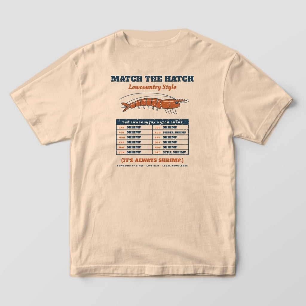 Ivory Comfort Colors tee, back view, with Match the Hatch lettering, a copper shrimp and a twelve-month hatch chart