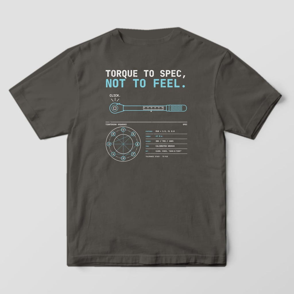 Back of a Pepper Comfort Colors 1717 tee with off-white and cyan Torque to Spec Not to Feel lettering, a torque wrench drawing, an 8-bolt star pattern and a spec table.