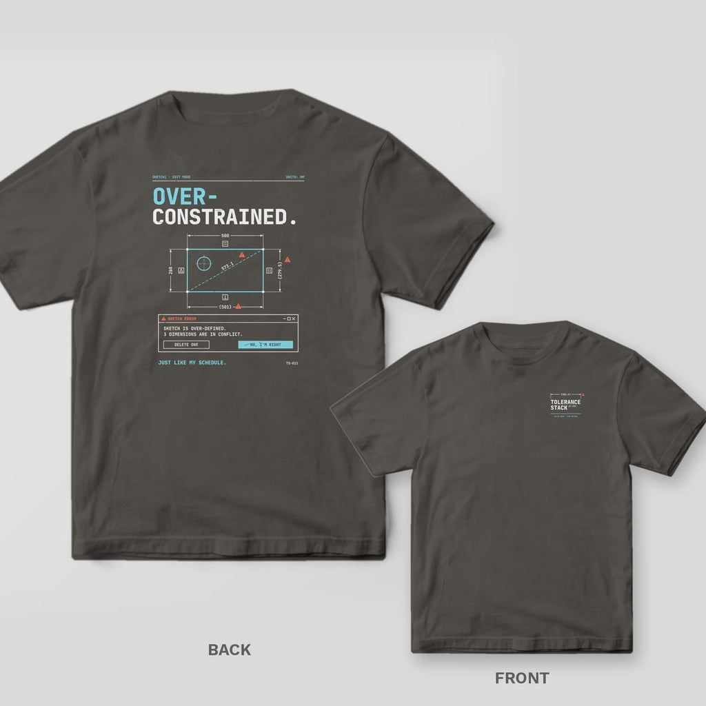 Pepper Comfort Colors tee shown back and front: an Over-Constrained CAD sketch error on the back and a small Tolerance Stack wordmark on the chest.