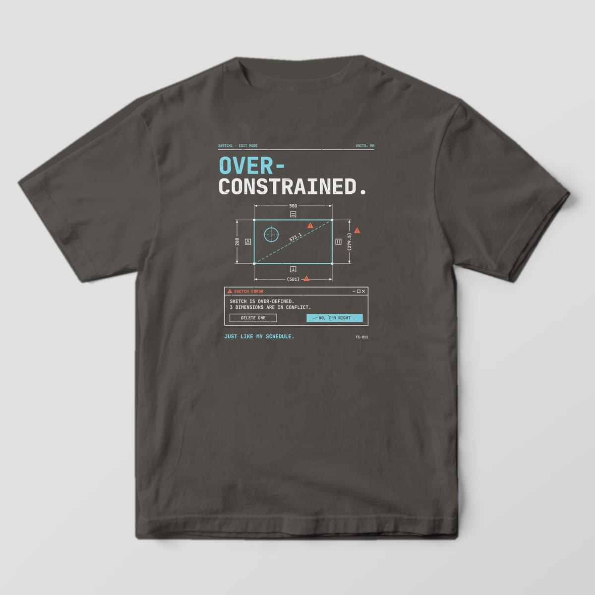 Back of a Pepper Comfort Colors 1717 tee with Over-Constrained in off-white and cyan type above a dimensioned sketch with orange warning triangles and an error dialog.