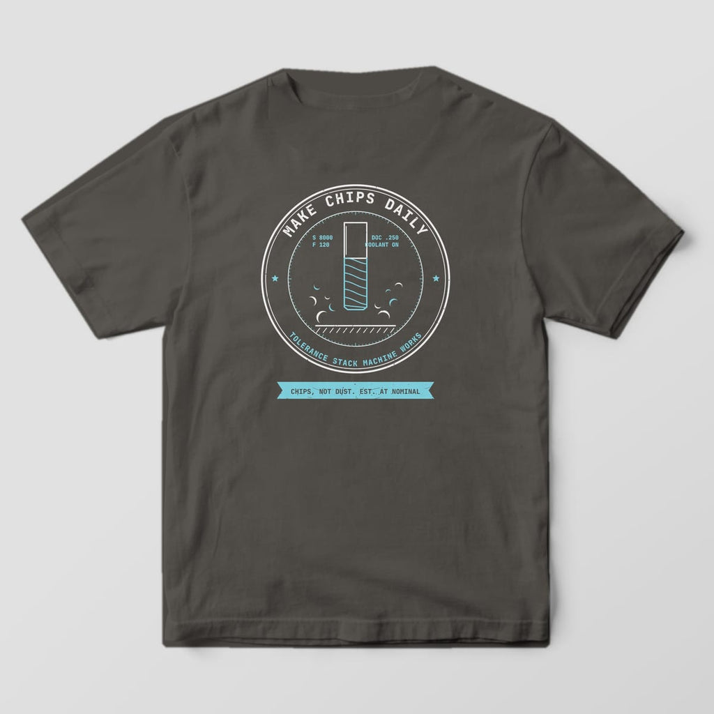 Back of a Pepper Comfort Colors 1717 tee with a large off-white and cyan Make Chips Daily badge showing an end mill and flying chips.