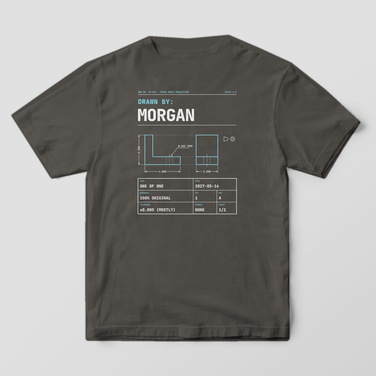 Back of a Pepper Comfort Colors 1717 tee with Drawn By: Morgan in large type, a cyan L-bracket drawing with dimensions and a title block with a sample date.