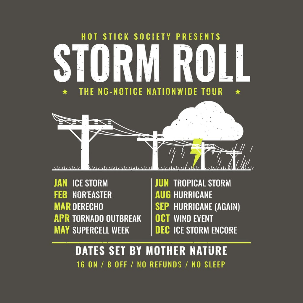Close-up of the Storm Roll Tour print artwork in hi-vis yellow and white on a dark background