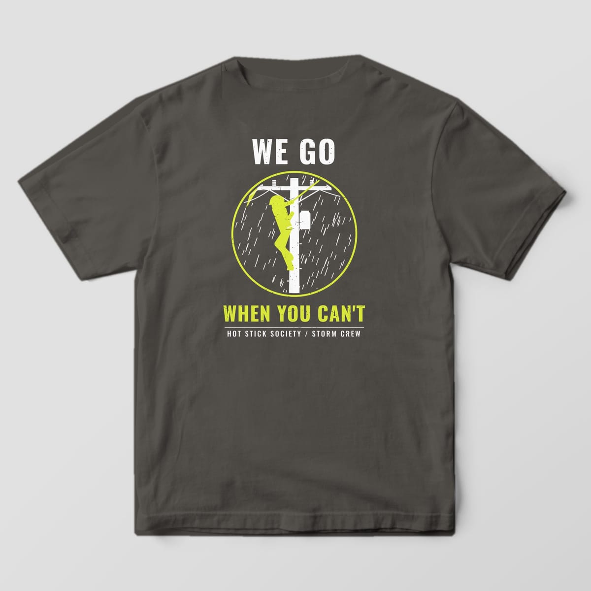 Back view of the pepper Comfort Colors 1717 shirt showing the We Go When You Can't back print in hi-vis yellow and white