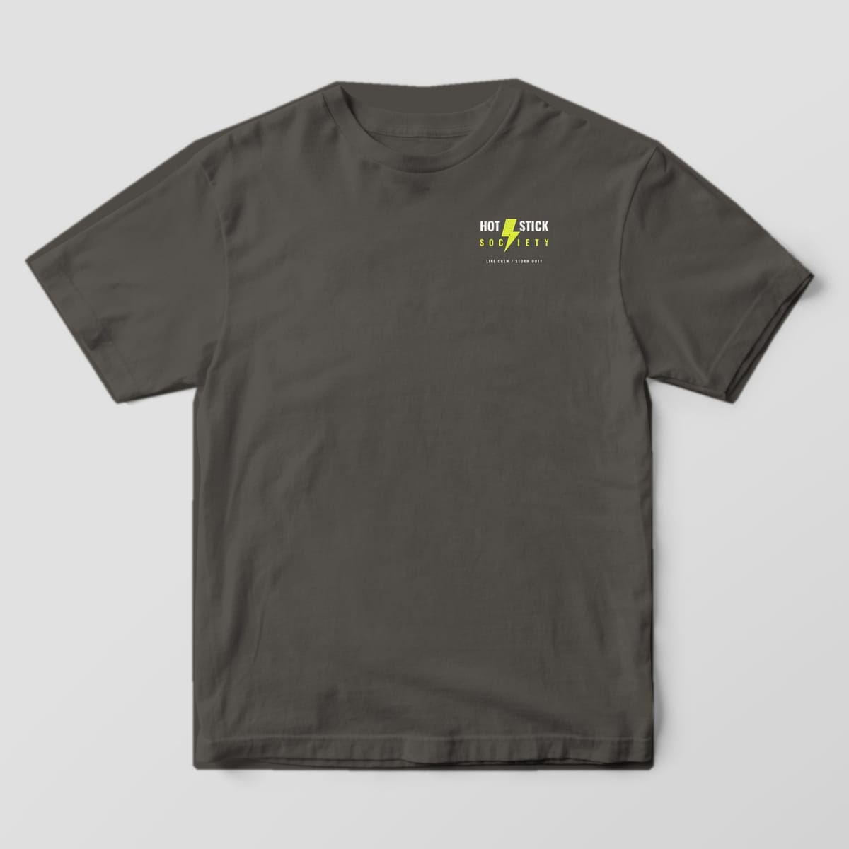 Front view of the pepper Comfort Colors 1717 shirt with the small left-chest Lights On print