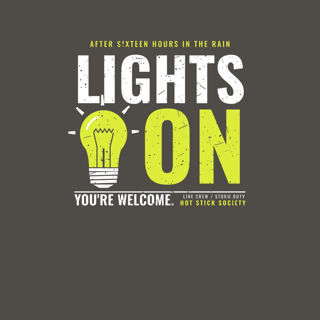 Close-up of the Lights On print artwork in hi-vis yellow and white on a dark background