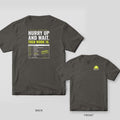 Back and front of a pepper Hurry Up and Wait Storm Time Card lineman T-shirt shown together, back print large on the left and the small chest print on the right