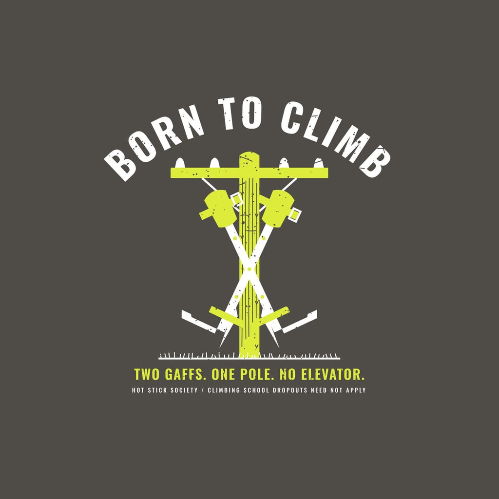 Close-up of the Born to Climb Gaffs print artwork in hi-vis yellow and white on a dark background