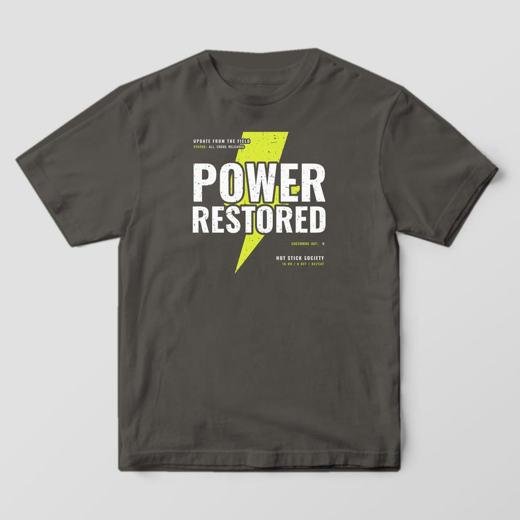 Front view of the pepper Comfort Colors 1717 shirt with the full-front Power Restored print