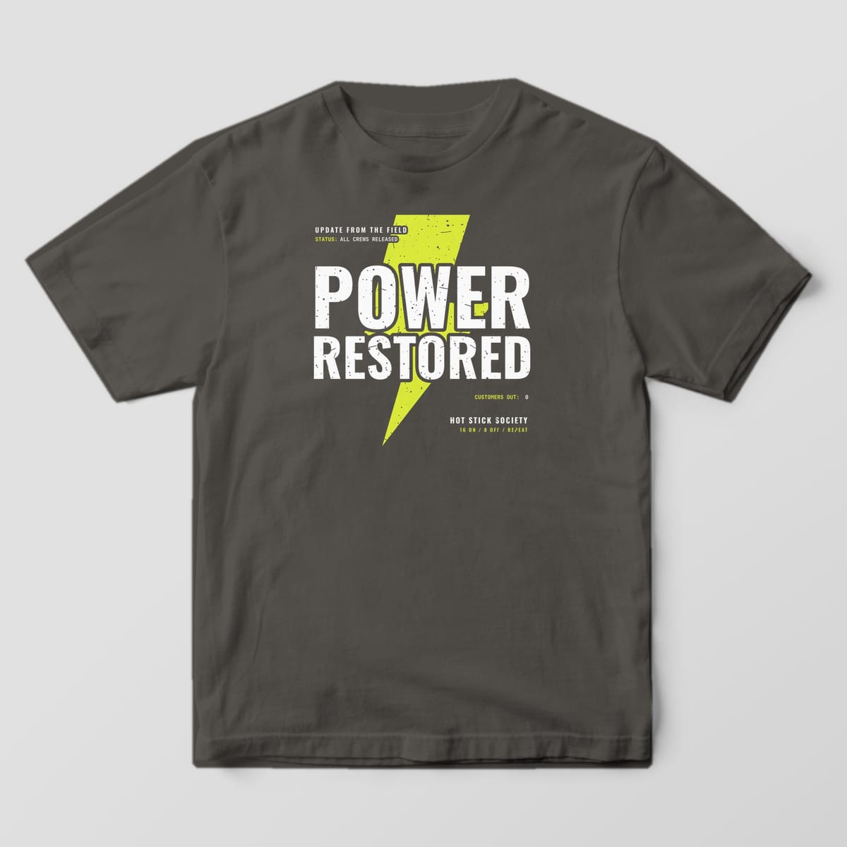 Front view of the pepper Comfort Colors 1717 shirt with the full-front Power Restored print
