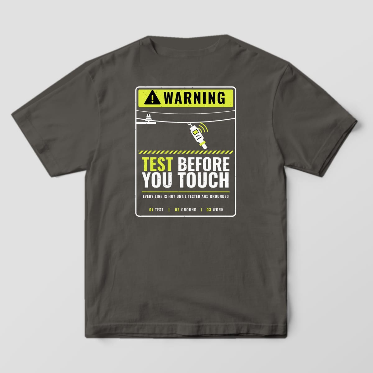 Back view of the pepper Comfort Colors 1717 shirt showing the Test Before You Touch warning-sign back print in hi-vis yellow and white