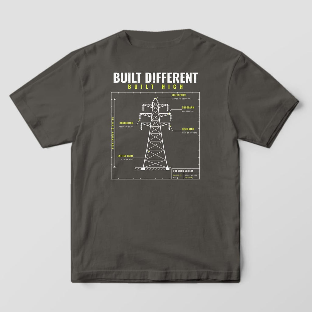 Back view of the pepper Comfort Colors 1717 shirt showing the Built Different Built High transmission tower blueprint back print in hi-vis yellow and white