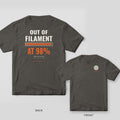 Out of Filament at 98 Percent 3D printing shirt shown back and front on Pepper Comfort Colors 1717: "Out of Filament" over an orange progress bar stopped at 98% with a dangling filament end, "At 98%" in big orange type and "Layer 2,071 of 2,113"