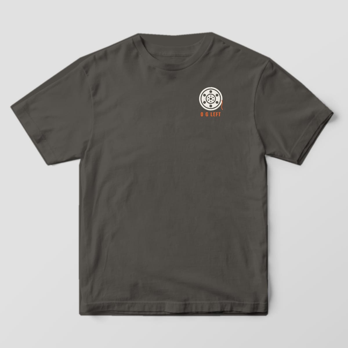 Front of the Pepper Comfort Colors 1717 tee showing the left-chest print: Small left-chest empty filament spool with a last orange strand and "0 G Left"
