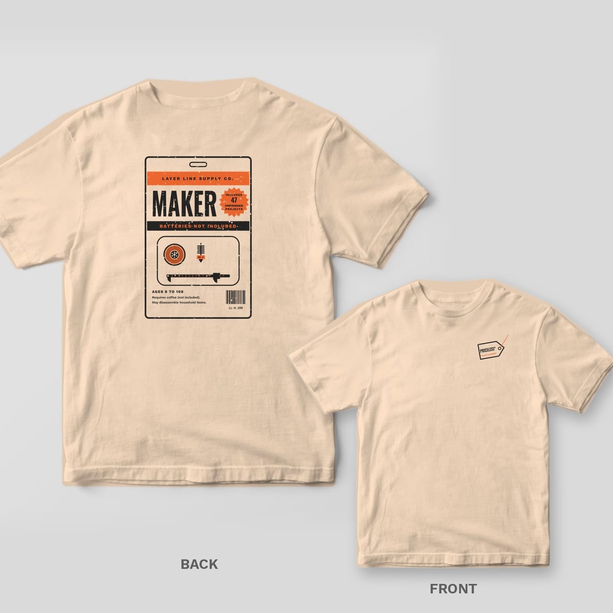 Maker Batteries Not Included 3D printing shirt shown back and front on Ivory Comfort Colors 1717: Retro blister card: Layer Line Supply Co. header, big "Maker", a starburst "Includes 47 Unfinished Projects", "Batteries Not Included" band,…