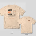 Made Not Bought 3D printing shirt shown back and front on Ivory Comfort Colors 1717: Stacked "Made, Not Bought." in charcoal and orange next to a tilted receipt comparing a hardware-store bracket to a 76-cent printed one, with "The printer paid…