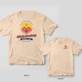 Dink Society Racquet Club pickleball shirt shown back and front on Ivory Comfort Colors 1717: Dink Society Racquet Club badge with crossed coral paddles over a striped yellow sunset