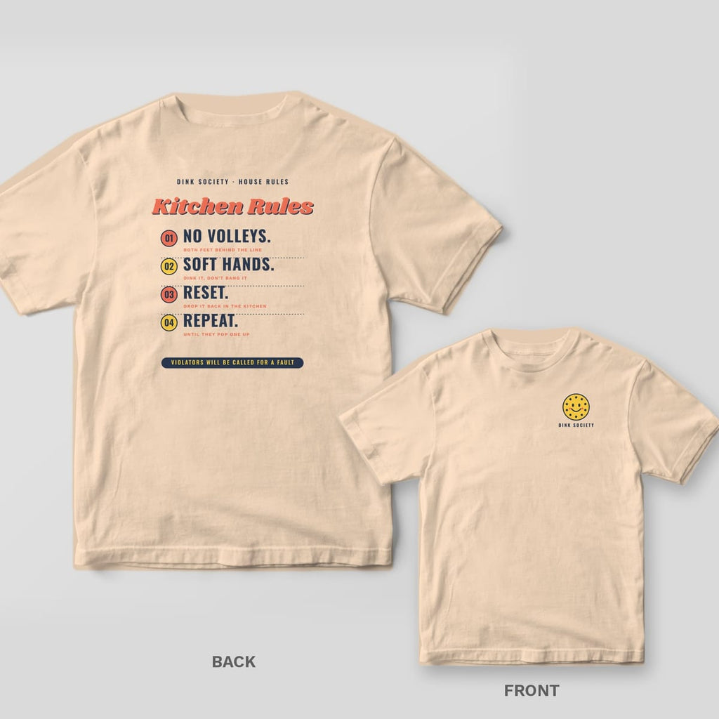 Kitchen Rules pickleball shirt shown back and front on Ivory Comfort Colors 1717: Kitchen Rules list reading No Volleys, Soft Hands, Reset, Repeat with numbered coral and yellow circles