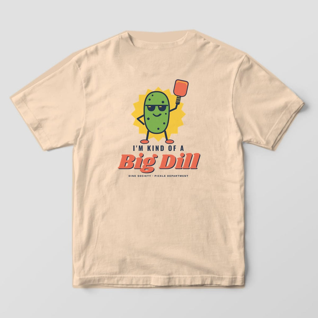 Back print on an Ivory Comfort Colors 1717 tee: Green pickle in sunglasses holding a coral paddle over a yellow burst with I'm Kind of a Big Dill text