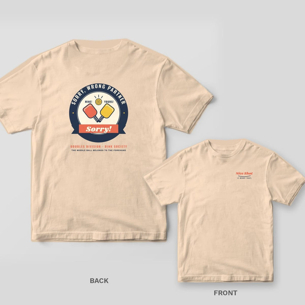 Sorry, Wrong Partner pickleball shirt shown back and front on Ivory Comfort Colors 1717: Round Sorry Wrong Partner badge with coral and yellow paddles labeled Mine and Yours under a ball