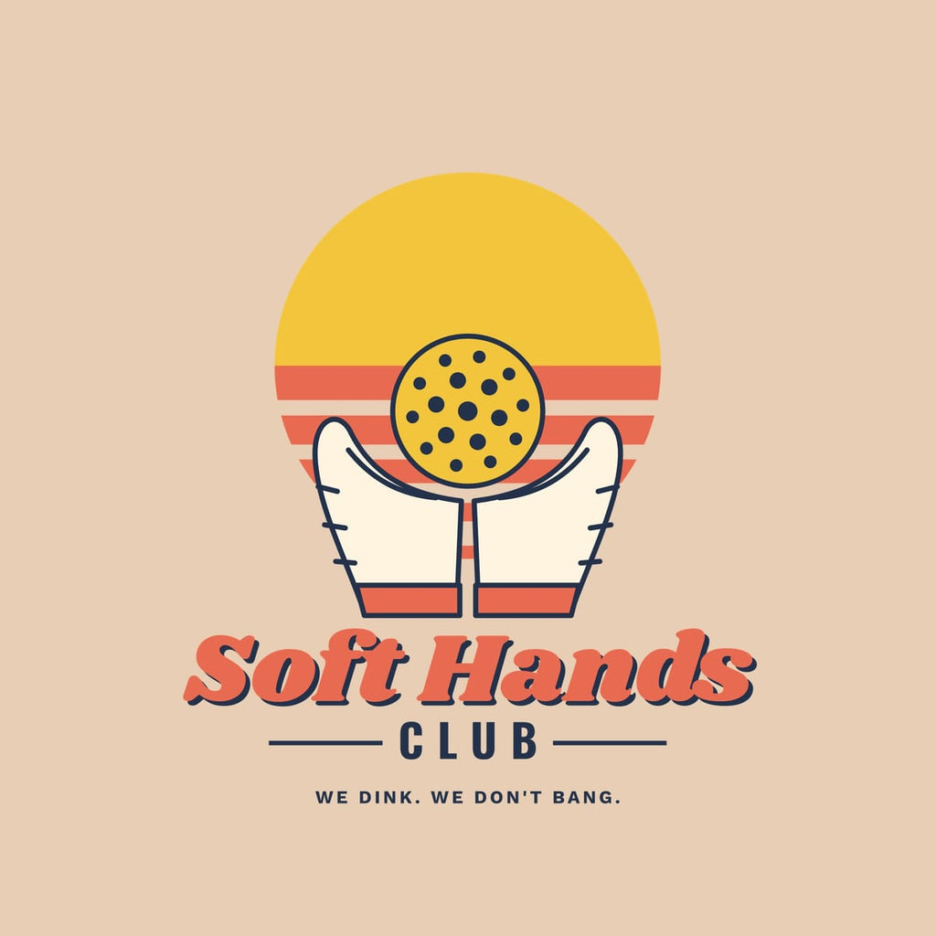 Close-up of the Soft Hands Club print showing navy, coral and yellow ink detail