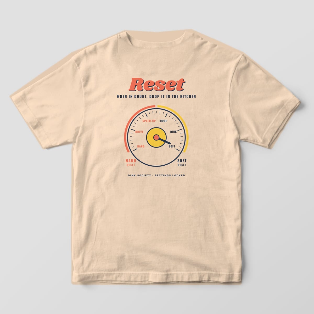 Back print on an Ivory Comfort Colors 1717 tee: Retro dial gauge with the needle set to Soft between Hard Reset and Soft Reset under Reset script