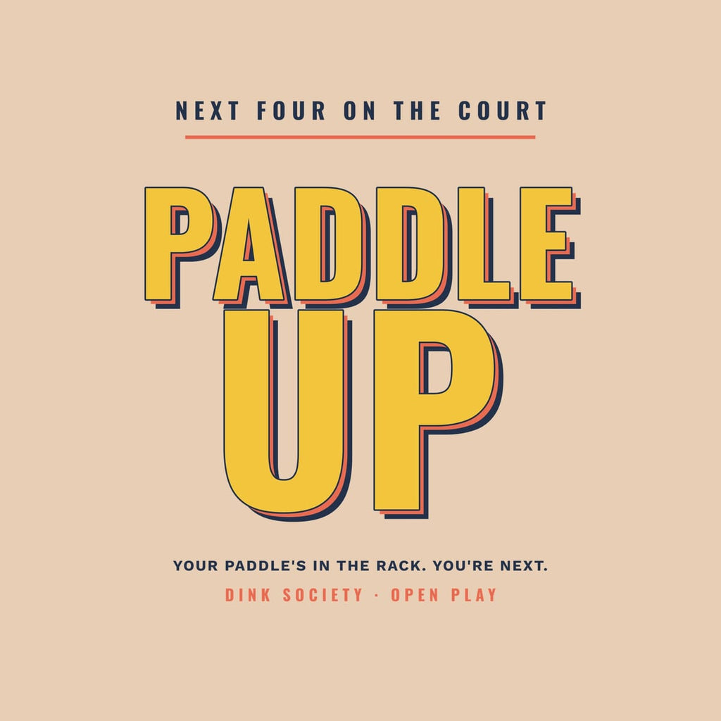 Close-up of the Paddle Up print showing navy, coral and yellow ink detail