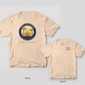 Court Side Social pickleball shirt shown back and front on Ivory Comfort Colors 1717: Round tropical badge with palm trees, crossed paddles and a yellow sun ringed by Court Side Social