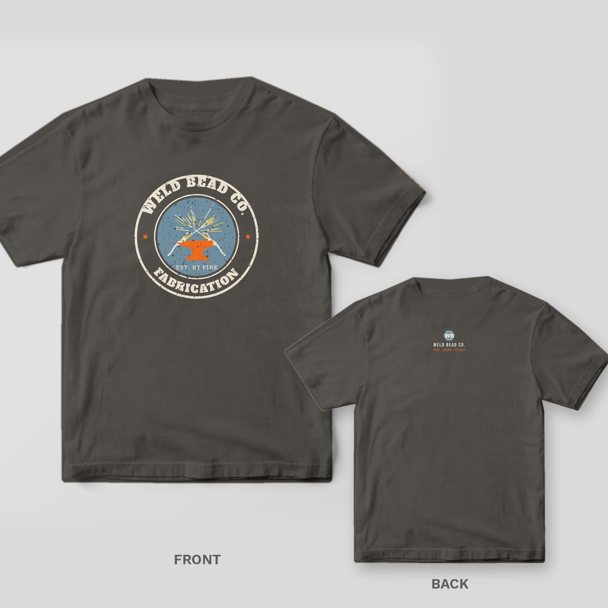 Weld Bead Co. Fabrication Badge welder shirt shown back and front on Pepper Comfort Colors 1717: Small back-neck hex nut "WB" logo with "Weld Bead Co." and "Fuse · Grind · Repeat"