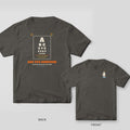 Arc Eye Survivor welder shirt shown back and front on Pepper Comfort Colors 1717: An eye chart spelling "Arc Eye Survivor" with acuity numbers, "It Felt Like Sand for Two Days" and "The Potato Slices Didn't Help Either"