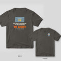 My Craft Allows Me to Be Sensitive to Light welder shirt shown back and front on Pepper Comfort Colors 1717: A Shade 10 lens plate over "My Craft Allows Me to Be Sensitive to Light" and "Got Flashed Once. Never Again."