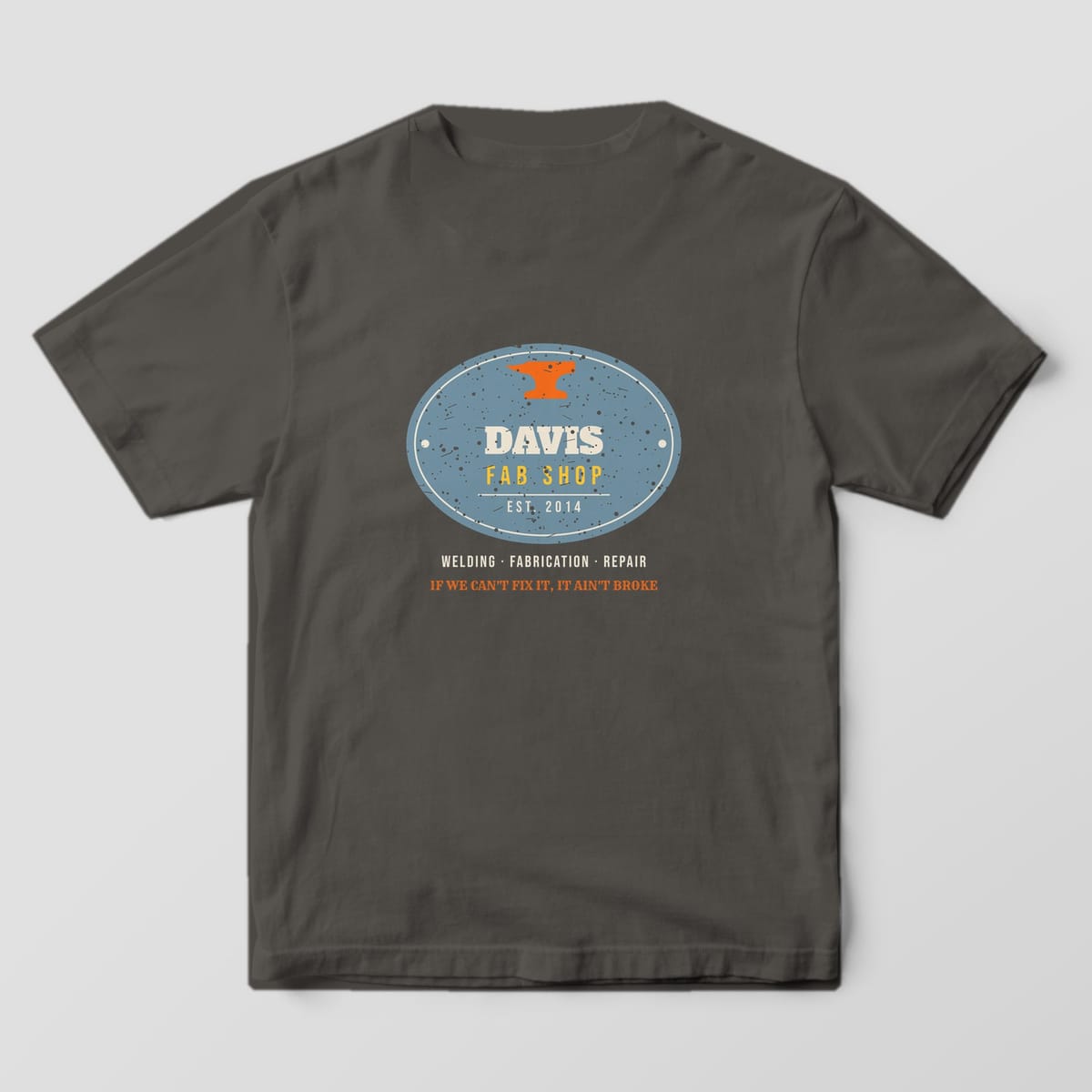 Back print on a Pepper Comfort Colors 1717 tee: Oval steel plate with an anvil, your shop name, "Fab Shop" and "Est." year, plus "Welding · Fabrication · Repair" and "If We Can't Fix It, It Ain't Broke"