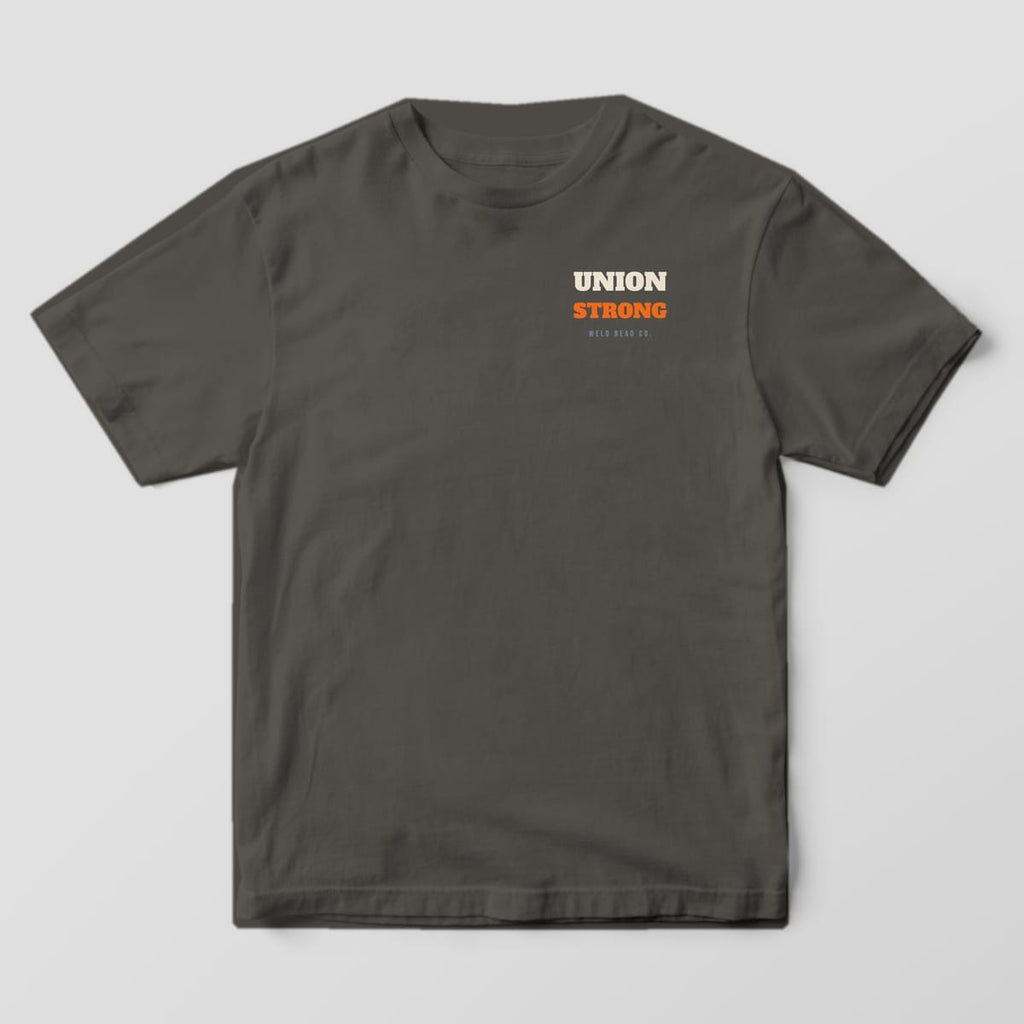 Front of the Pepper Comfort Colors 1717 tee showing the left-chest print: Left-chest "Union Strong" in stacked slab type with "Weld Bead Co."