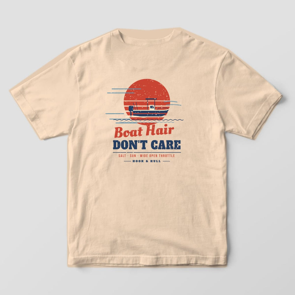 Back of an ivory Comfort Colors 1717 T-shirt showing the center console boat speeding across a striped red sunset with wind lines and the words Boat Hair Don't Care