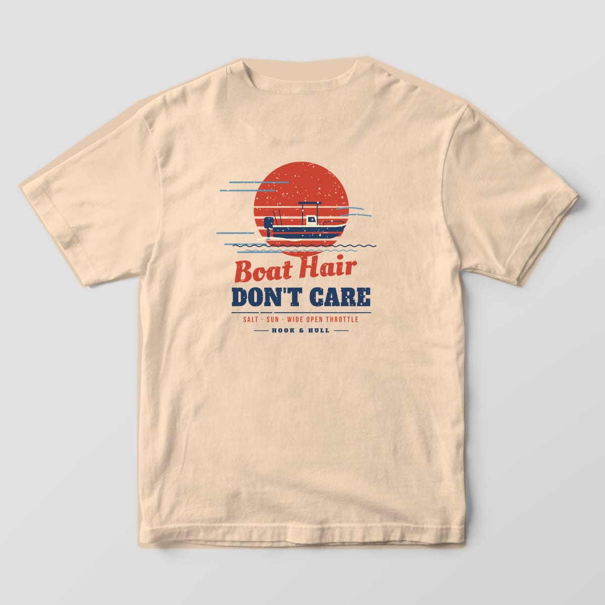 Back of an ivory Comfort Colors 1717 T-shirt showing the center console boat speeding across a striped red sunset with wind lines and the words Boat Hair Don't Care