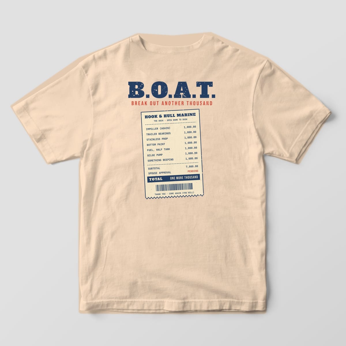 Back of an ivory Comfort Colors 1717 T-shirt showing the large B.O.A.T. Break Out Another Thousand lettering above a long receipt of boat repairs at a thousand dollars each