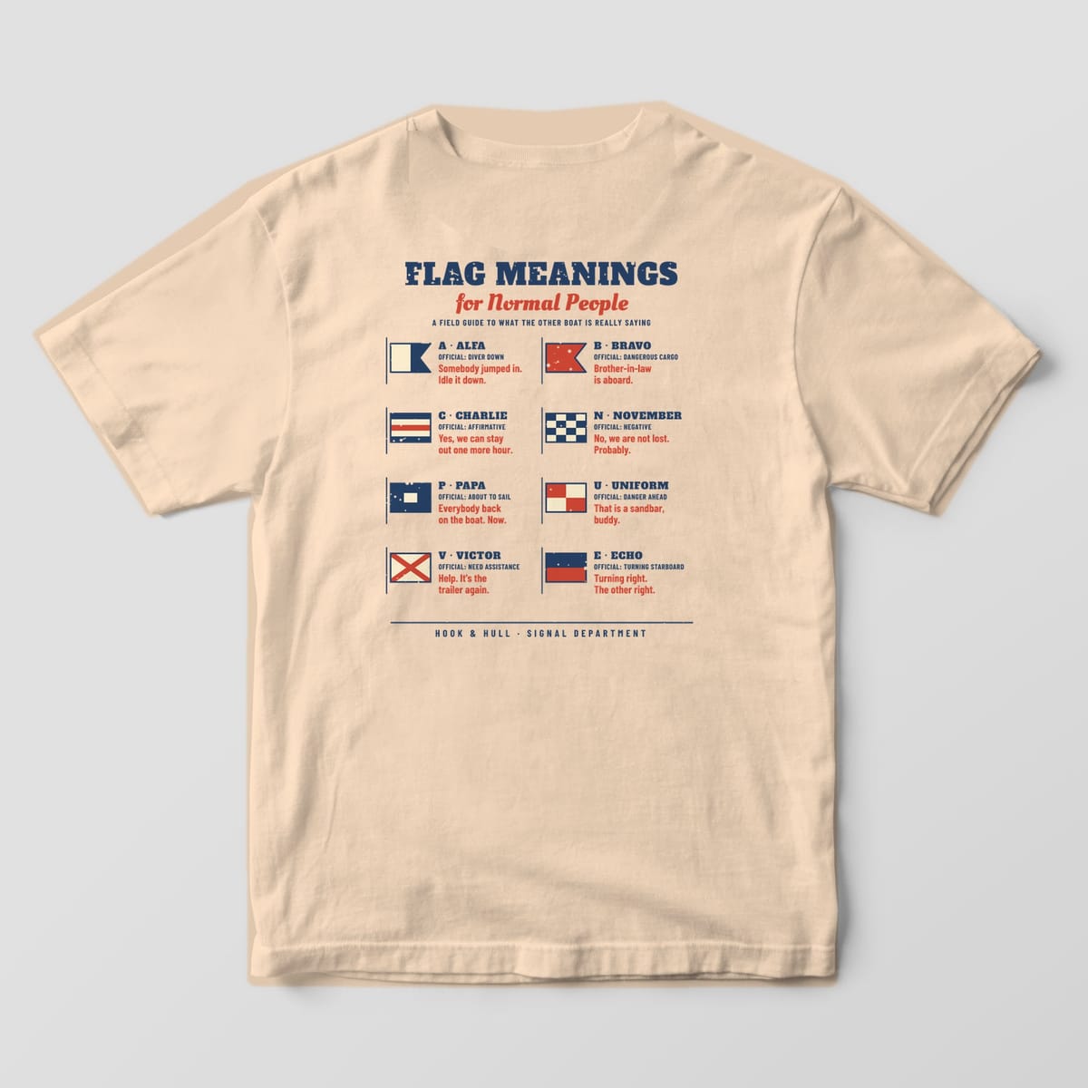 Back of an ivory Comfort Colors 1717 T-shirt showing the chart of eight nautical signal flags with official meanings and funny translations under the title Flag Meanings for Normal People