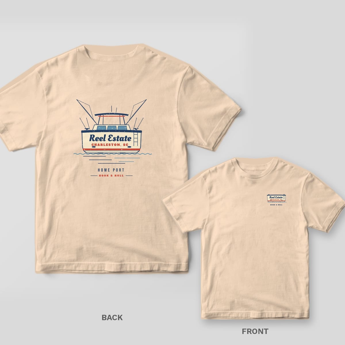 Back and front of an ivory Comfort Colors T-shirt with a stern view of a sportfishing boat with outriggers and the name Reel Estate, Charleston SC lettered on the transom; small chest print on the front