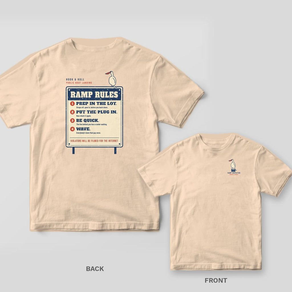 Back and front of an ivory Comfort Colors T-shirt with a boat landing sign reading Ramp Rules with four numbered rules and a pelican perched on the corner; small chest print on the front