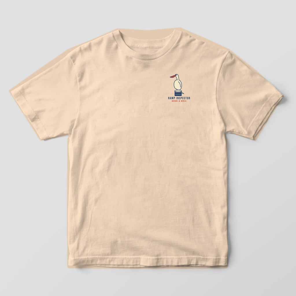 Front of an ivory Comfort Colors 1717 T-shirt with a small left-chest print