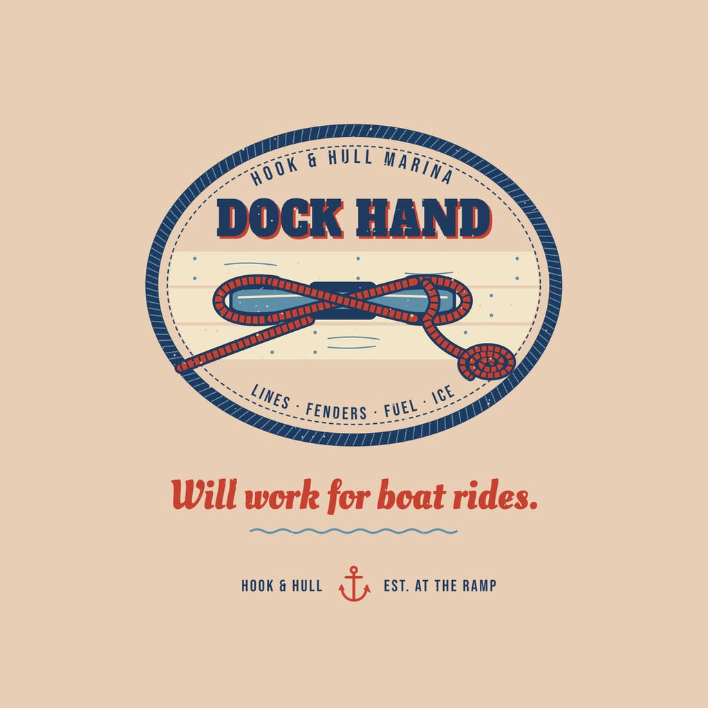 Close-up of the back print artwork on an ivory background: an oval Dock Hand patch with a rope tied in a cleat hitch on dock planks and the line Will work for boat rides