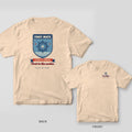 Back and front of an ivory Comfort Colors T-shirt with a shield badge with a ship's wheel, the words First Mate, a Second in Command ribbon and the line First to the cooler; small chest print on the front
