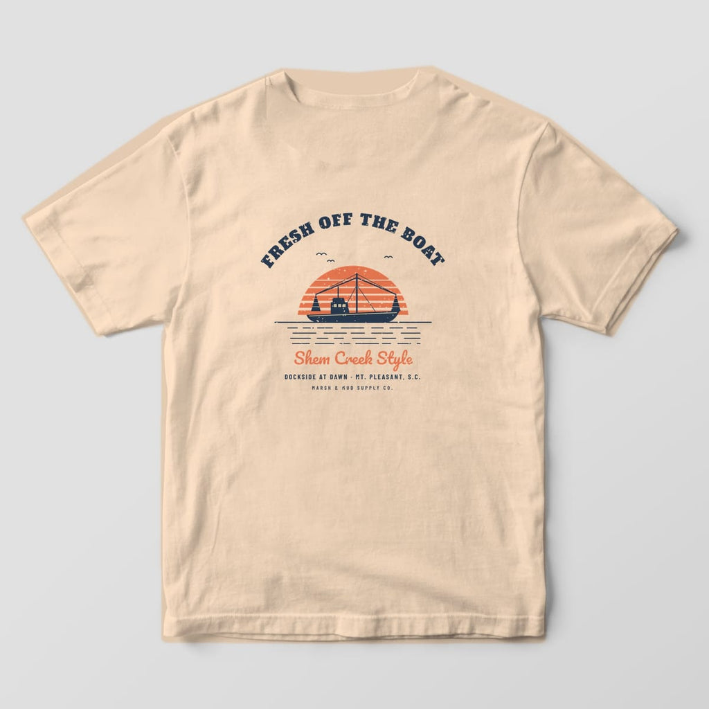 Back of an ivory Comfort Colors 1717 tee with a navy shrimp trawler over a striped coral sunset