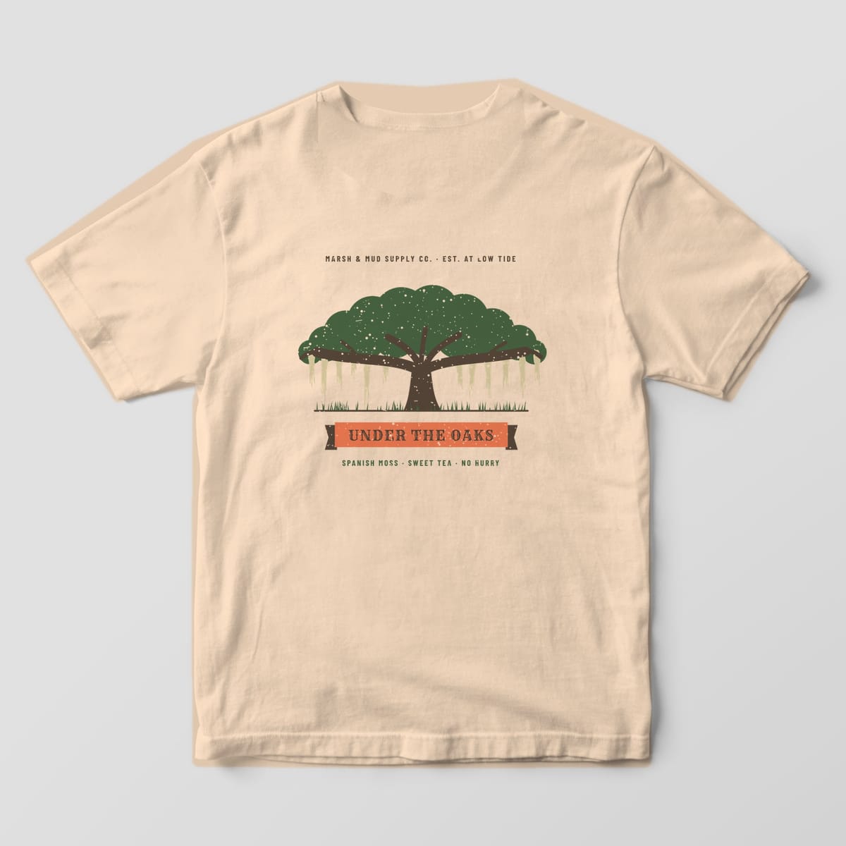 Back of an ivory Comfort Colors 1717 tee with a large green live oak draped in moss over a coral banner