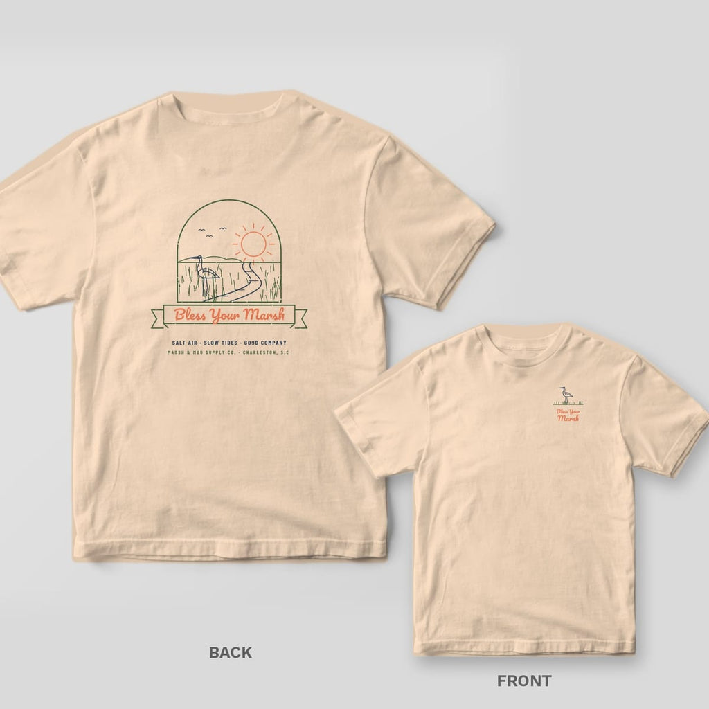 Back and front of an ivory Comfort Colors tee with a marsh egret arch badge and Bless Your Marsh banner
